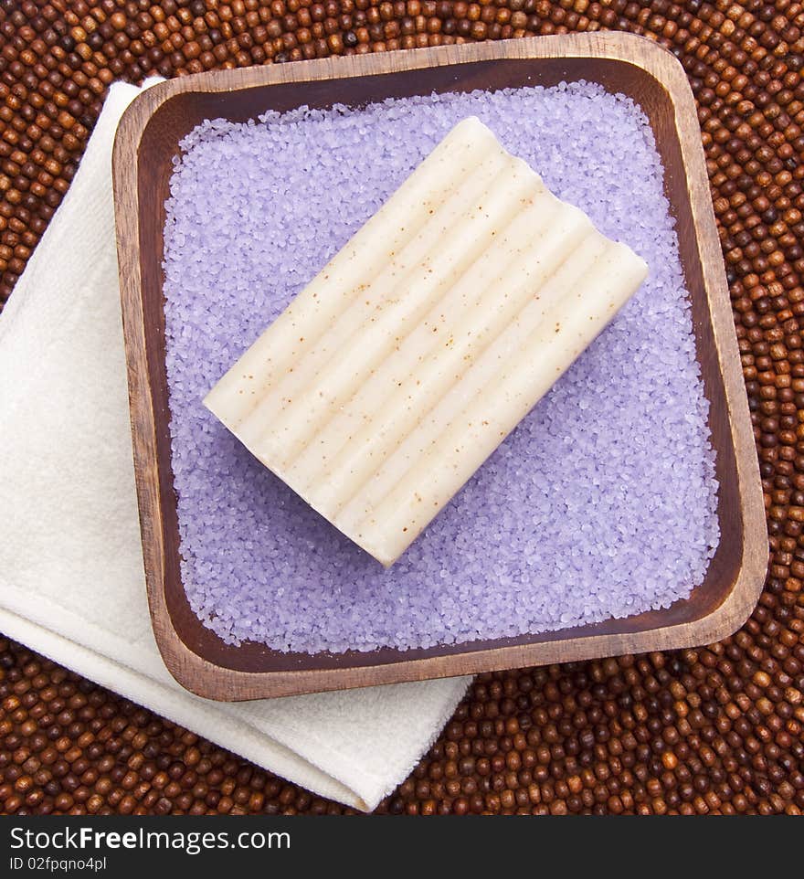 Serene scene from a spa treatment with lavendar bath salts and fine soap. Serene scene from a spa treatment with lavendar bath salts and fine soap.