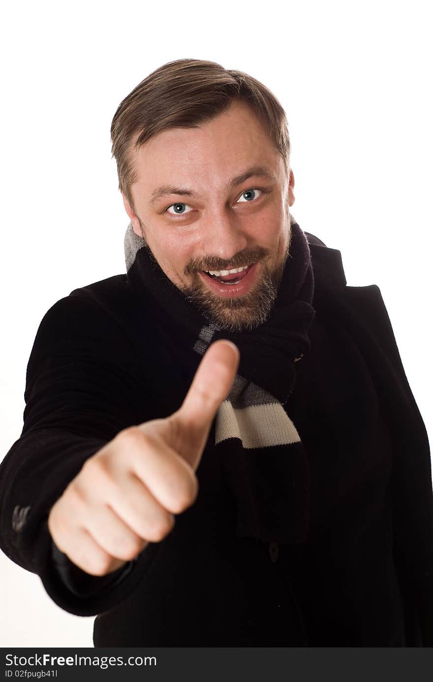 Happy man in a black coat with a white background