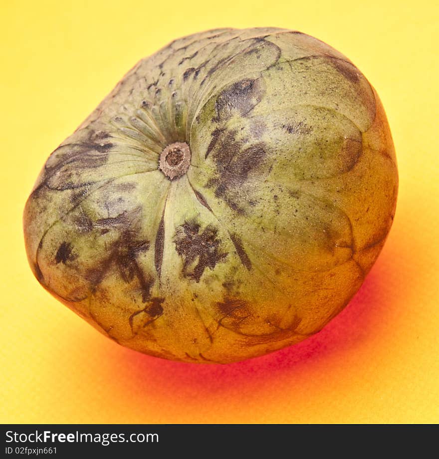 Cherimoya on a vibrant yellow background. Cherimoya on a vibrant yellow background.