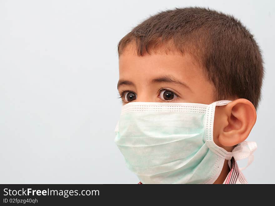 Wear a mask to protect children from diseases. Wear a mask to protect children from diseases