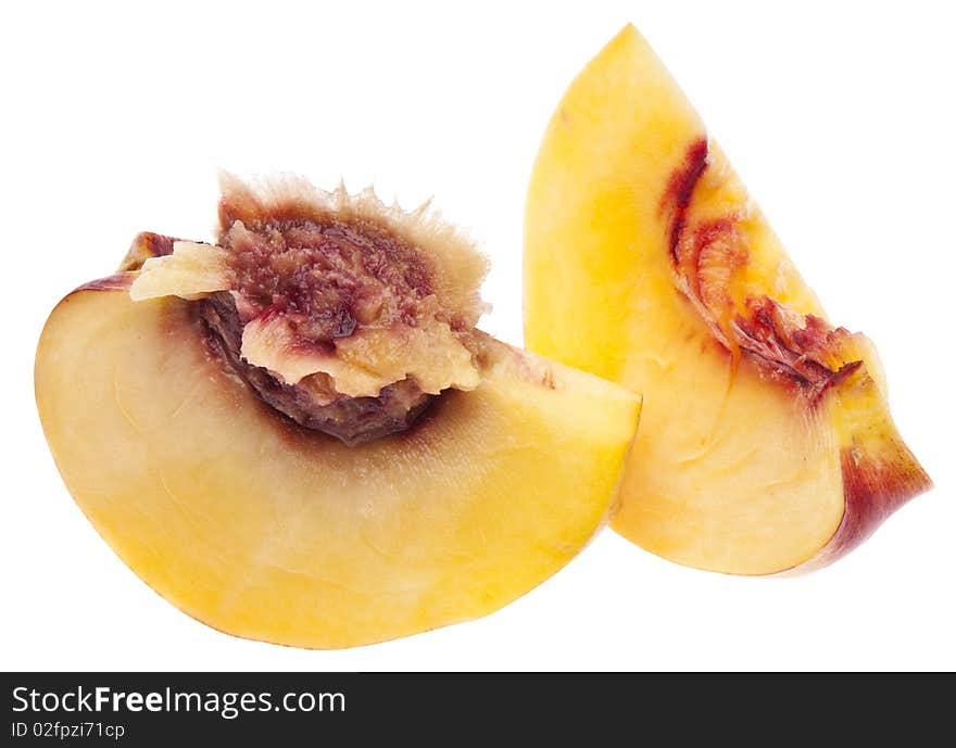 Sliced Nectarine with pit isolated on white with a clipping path.