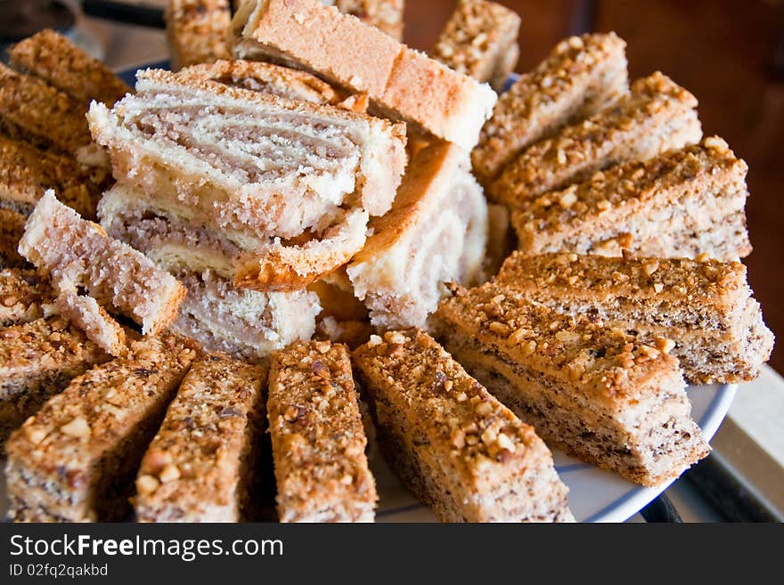 Cake and cookies home made arranged on a plate