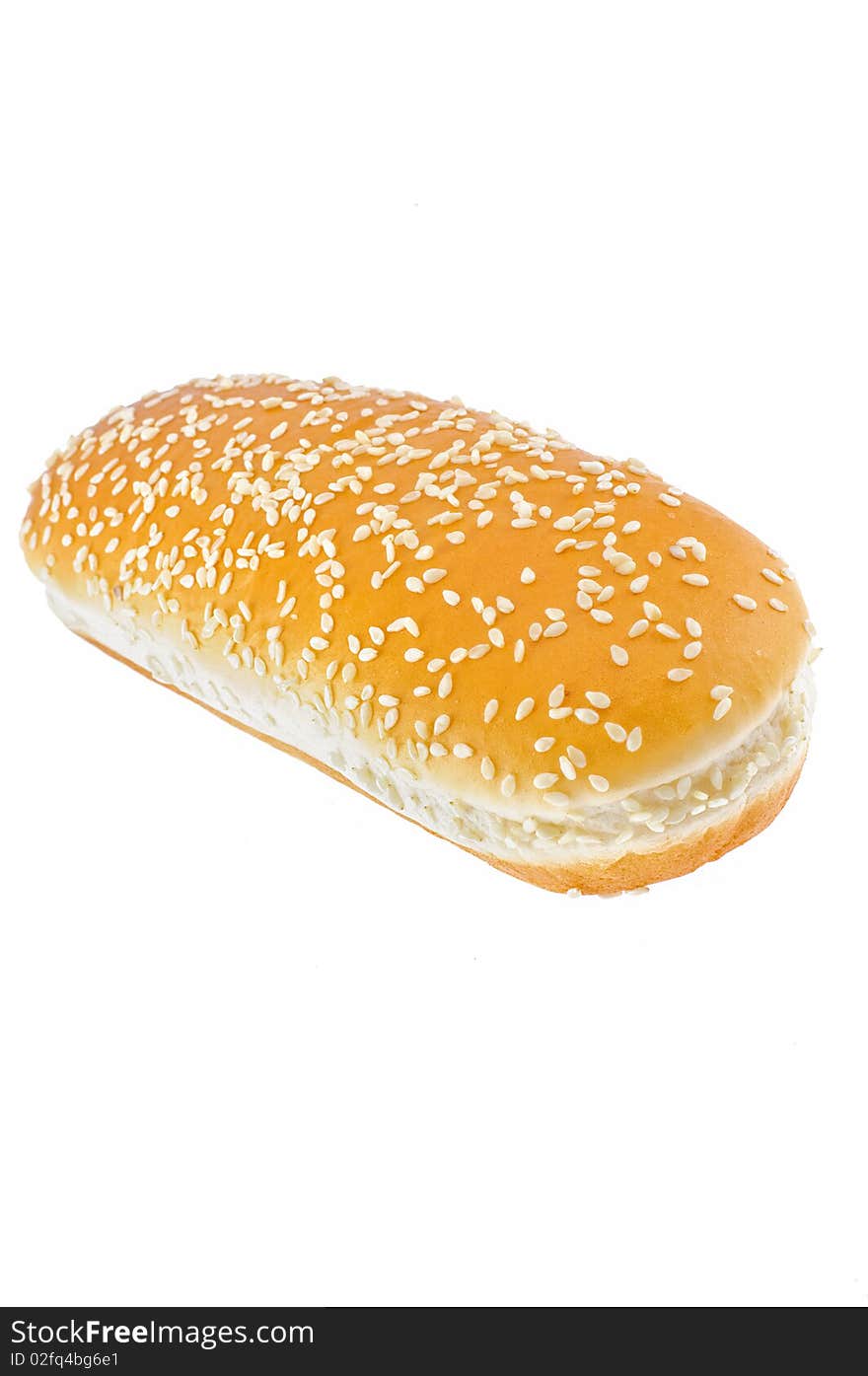 Appetizing bun with sesame isolated on white