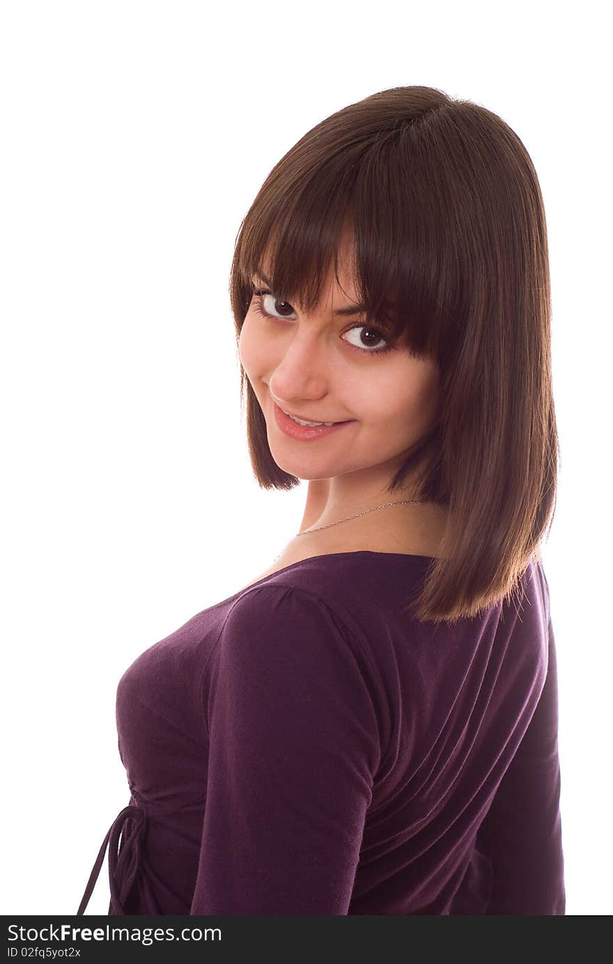 Young pretty girl standing on a white background