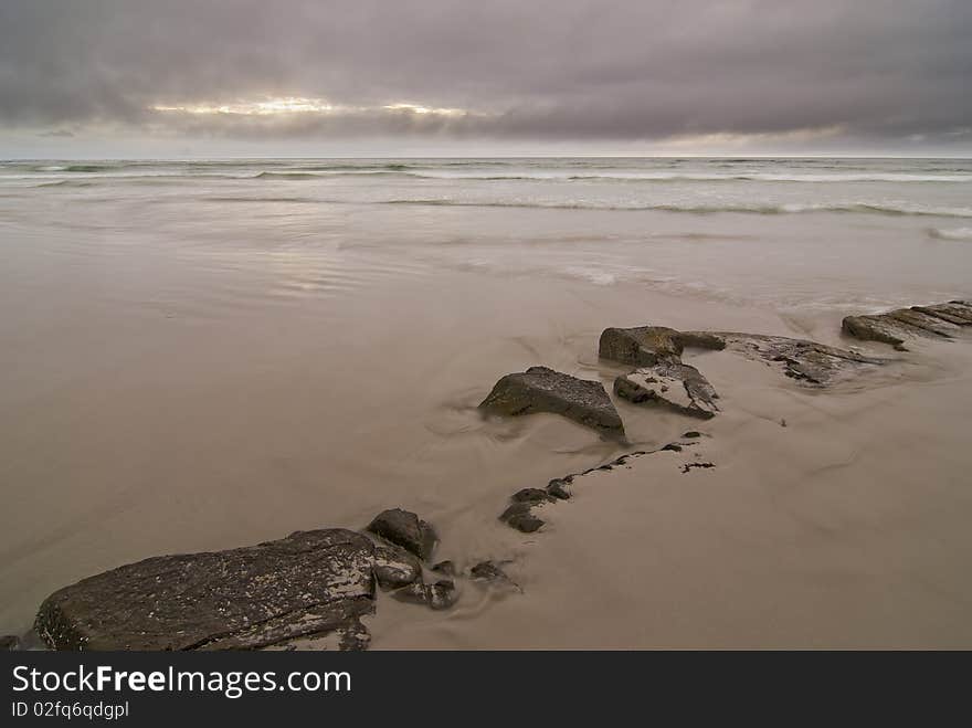 Rocky beach with dramatic sky