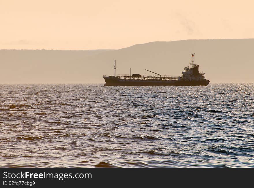 Port of Vladivostok. Tank on rails in the Amur Bay