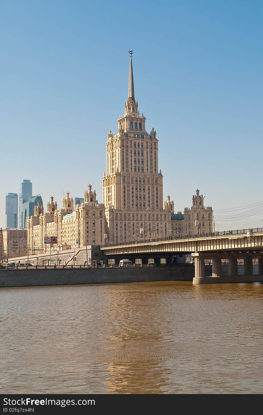 Urban building about quay in the spring afternoon