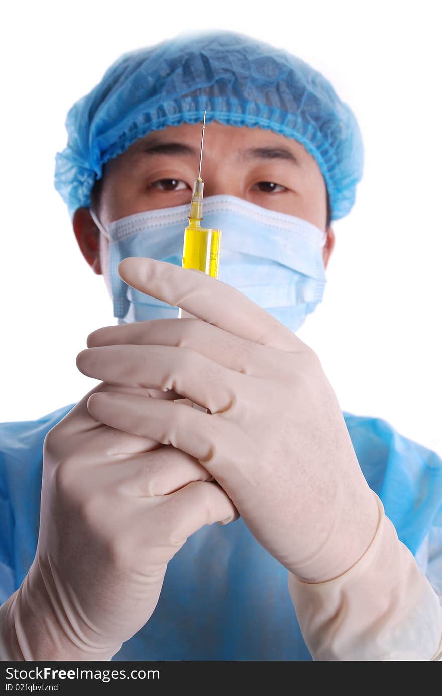 Doctor using a syringe