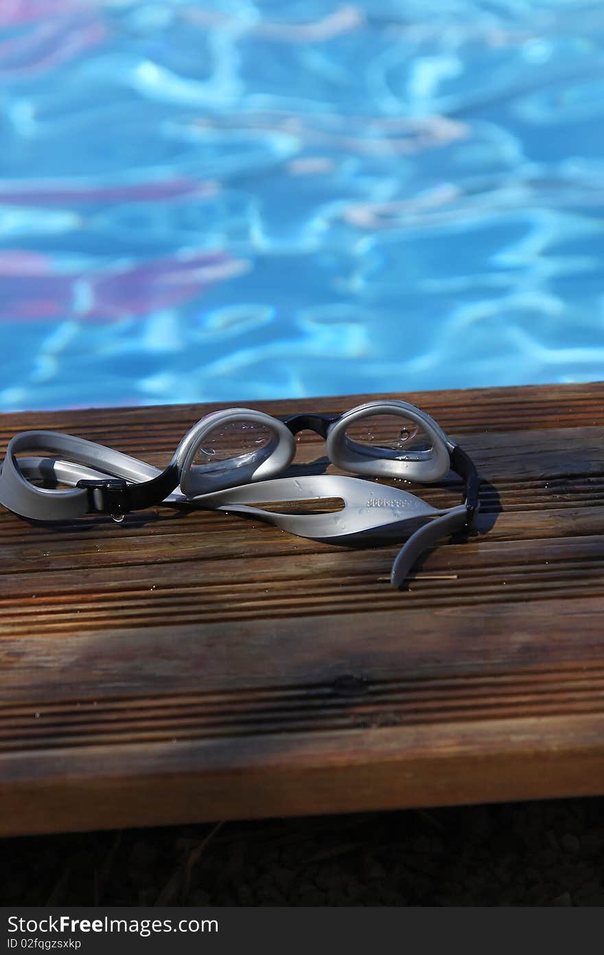 Refractor diving in the pool in summer. Refractor diving in the pool in summer