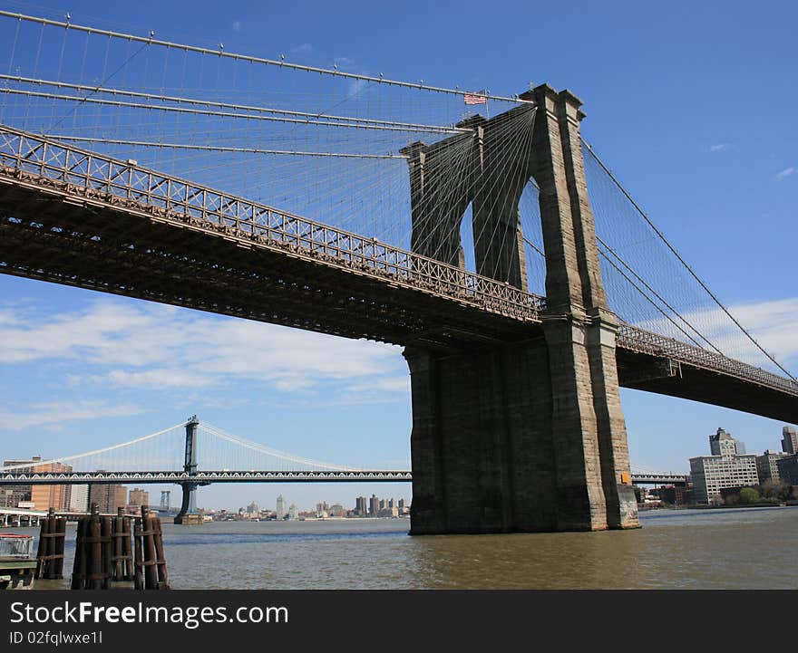 Brooklyn and Manhattan Bridges as seen from the Manhattan side of the East River. Brooklyn and Manhattan Bridges as seen from the Manhattan side of the East River.