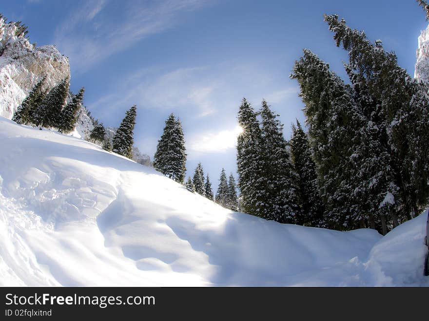 Smooth sunny winter mountains