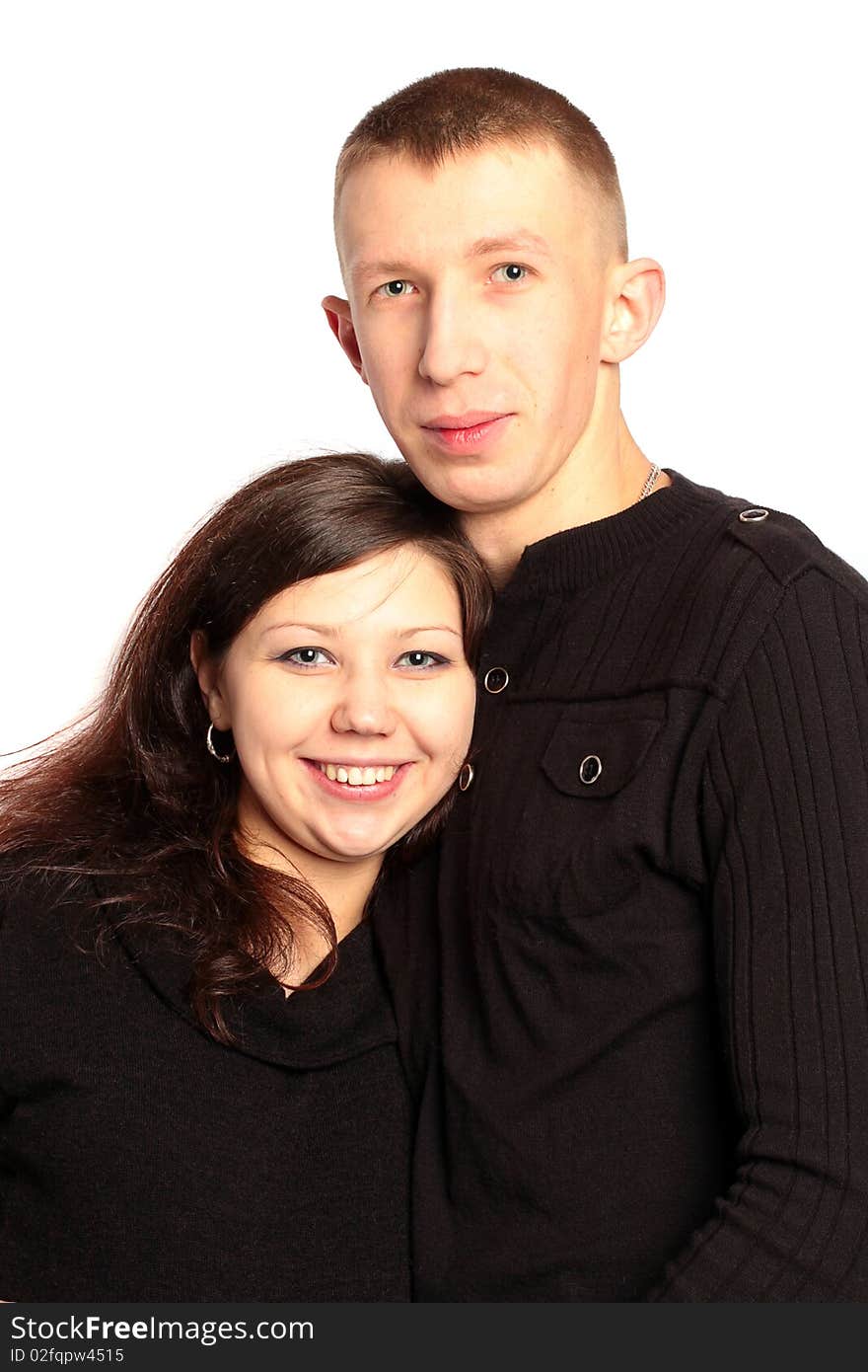 Lovely young man and woman isolated on a white background. Happy couples. Lovely young man and woman isolated on a white background. Happy couples