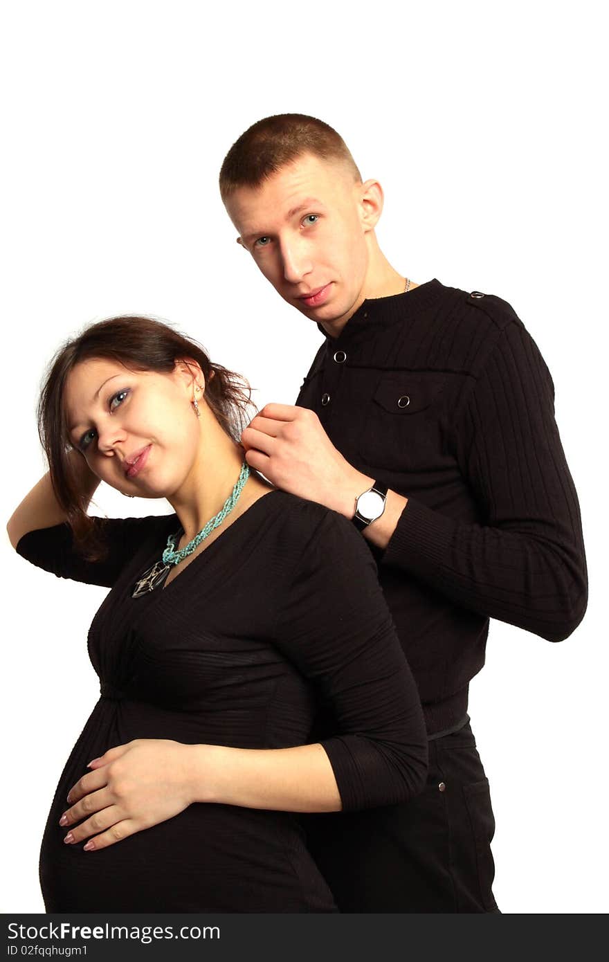 Beautiful pregnant woman and a happy man