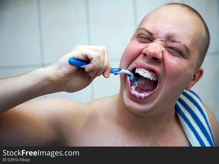 Man Brushing His Teeth