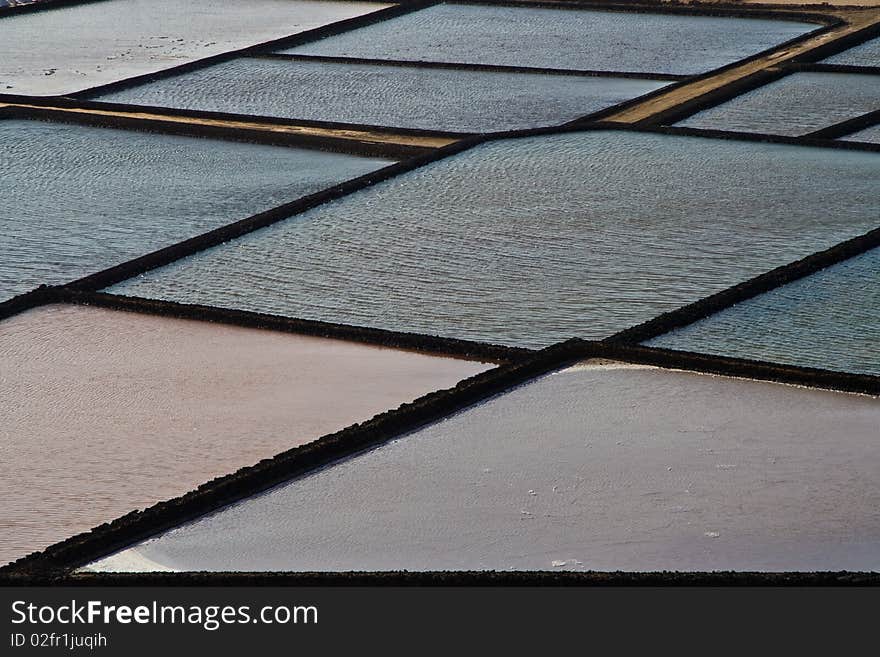 Traditional salt basins in the salina of Janubio in Lanzarote