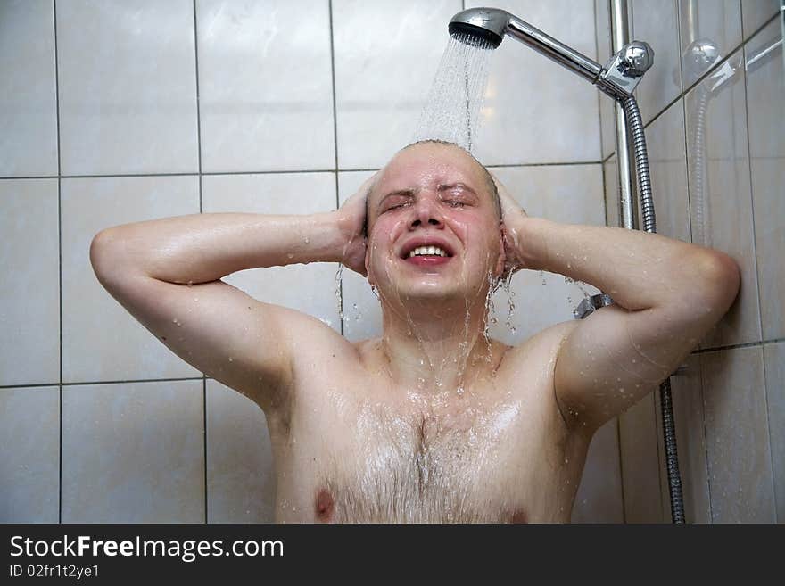 Man Enjoys The Washing In The Shower