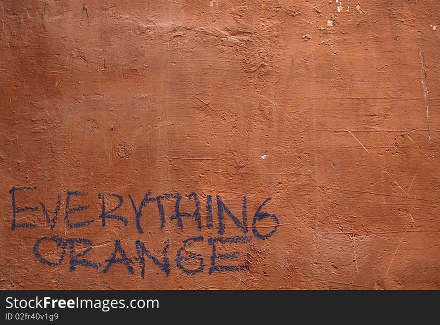 Orange painted wall in Rome, Italy. Orange painted wall in Rome, Italy