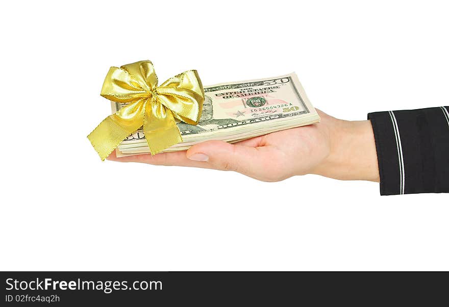 Dollars with bow on hand isolated on white. Dollars with bow on hand isolated on white