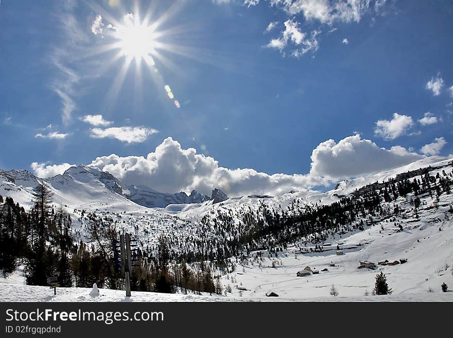 The sun shining on mountain peaks. The sun shining on mountain peaks