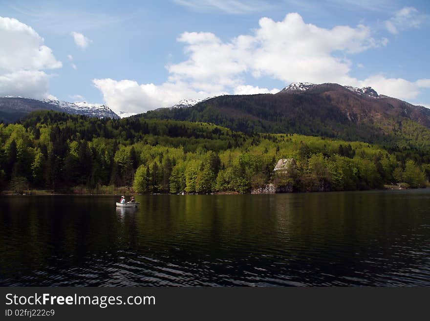 Lake Bohinj, Slovenia, with small boat. Lake Bohinj, Slovenia, with small boat