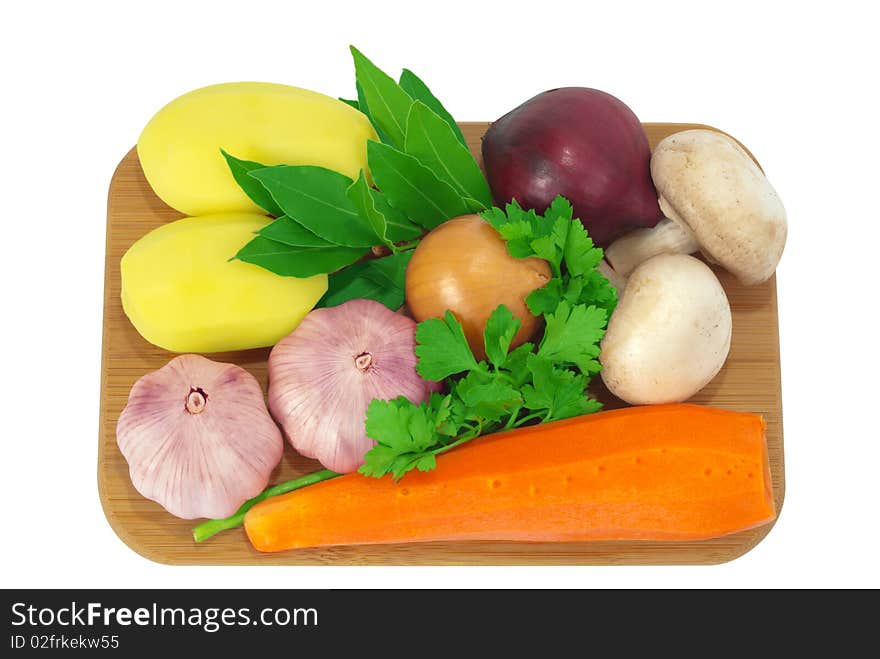 Board with potatoes, garlic