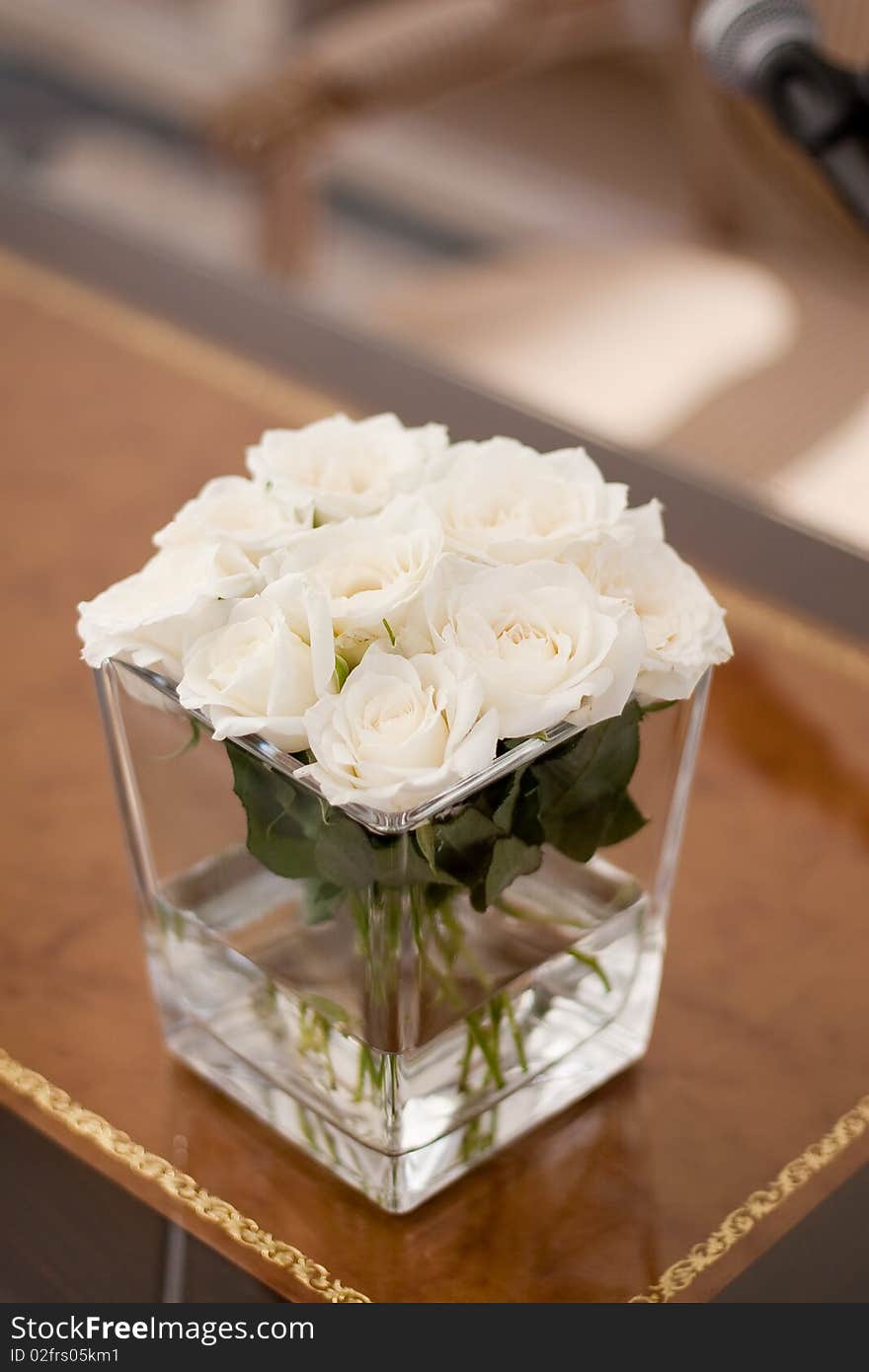 Vase with withe roses at a wedding. Vase with withe roses at a wedding