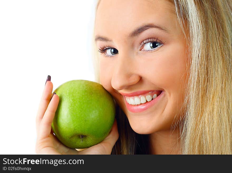 Pretty young woman with green apple.