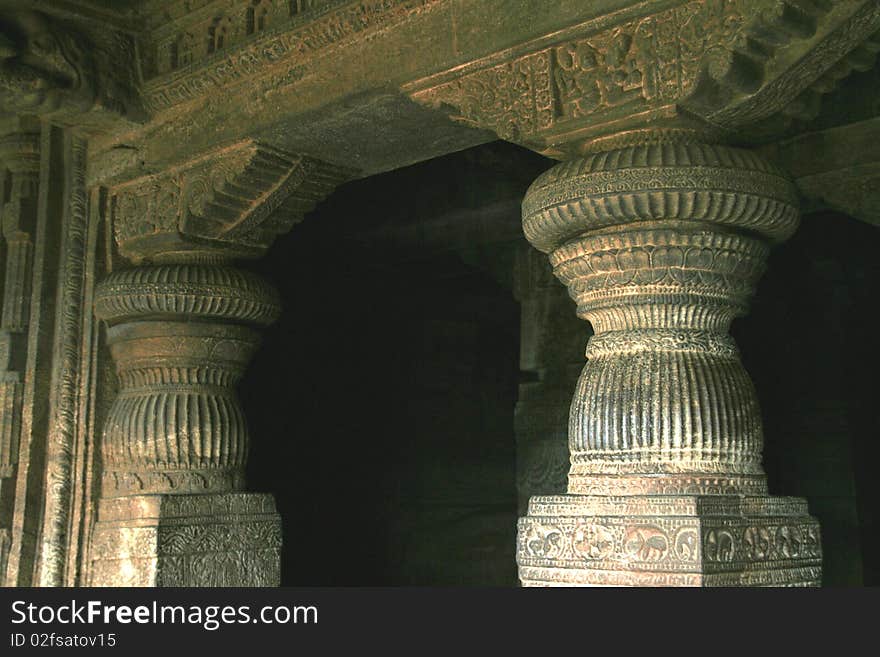 Beautifully carved stone pillars at cave temple in Badami, Karnataka, India, Asia