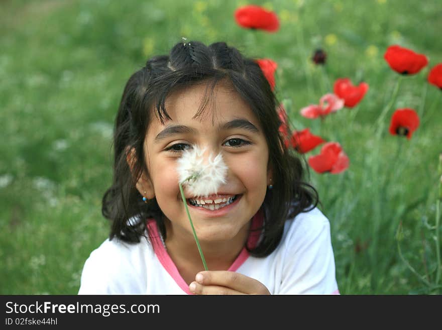 Flowers in the garden of his home in a happy girl image. Flowers in the garden of his home in a happy girl image