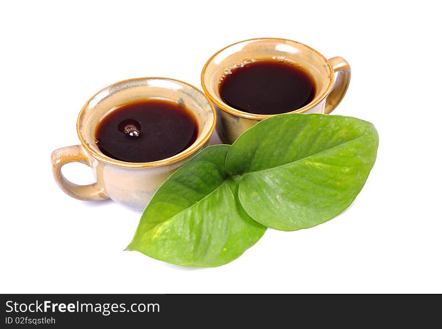 Two cup of black tea isolated on white background.