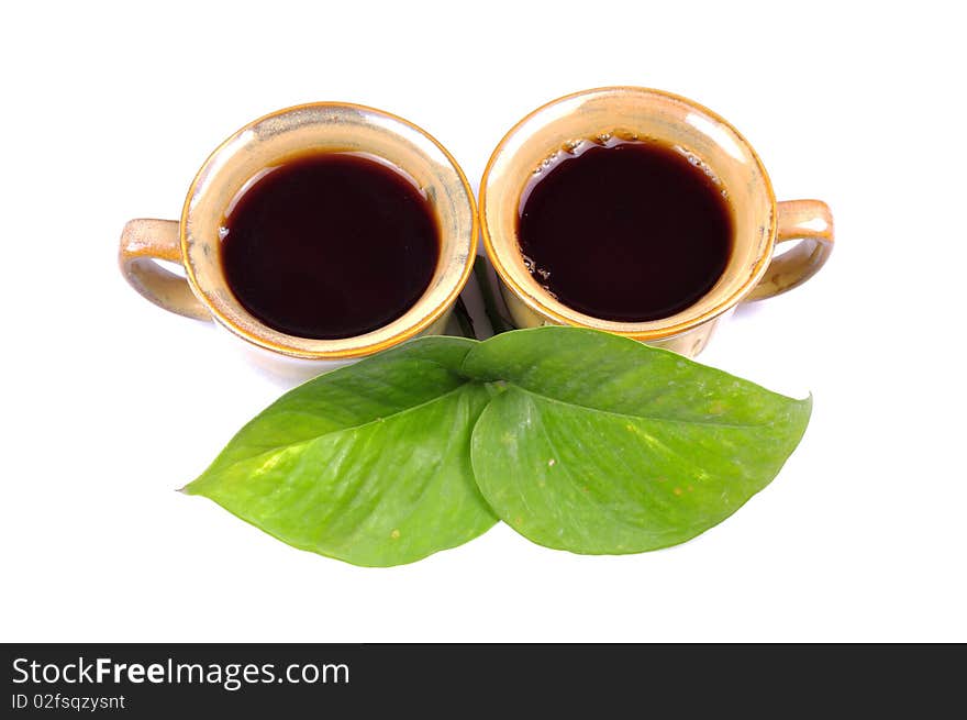 Two cup of black tea isolated on white background.