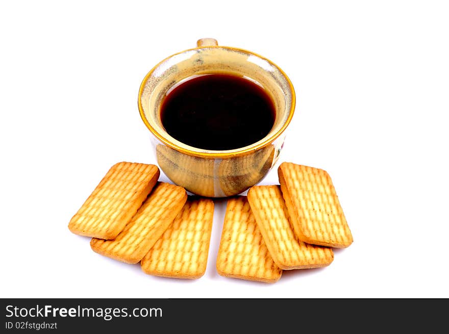 Tea and biscuits isolated on white background. Tea and biscuits isolated on white background.