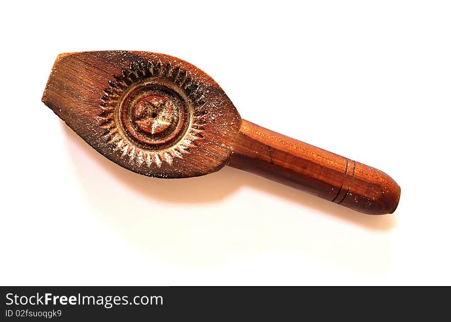 Wooden spoon carved from the inside with different textures aimed for identifying with maamool cookie is either pistachio, walnut or date. Wooden spoon carved from the inside with different textures aimed for identifying with maamool cookie is either pistachio, walnut or date