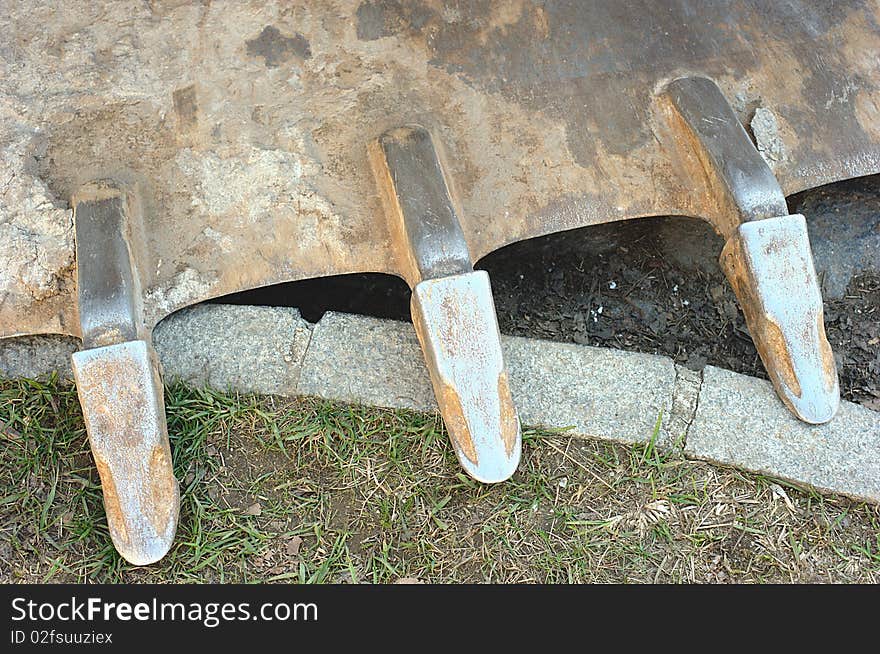 Three backets teeth of an excavator