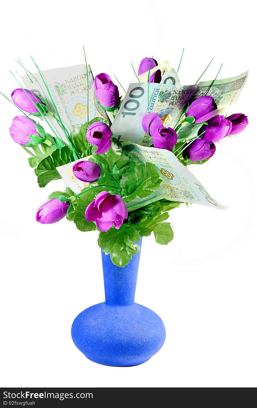 Picture shows a bouquet of flowers in a vase. The flowers are Polish money which imitate leaves. Picture shows a bouquet of flowers in a vase. The flowers are Polish money which imitate leaves.