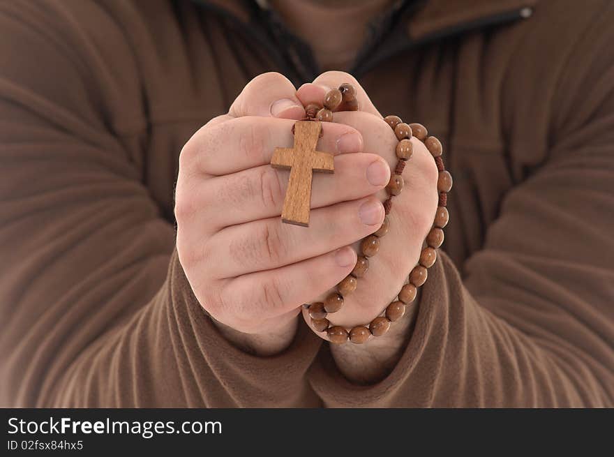 Showing a religious cross and prey. Showing a religious cross and prey