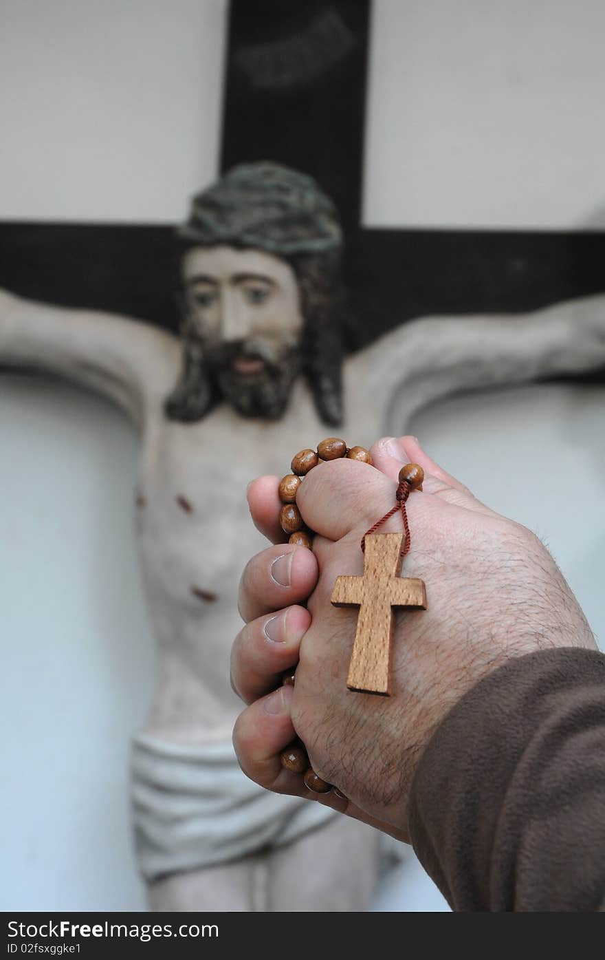 Image of the hands of a men praying. Image of the hands of a men praying