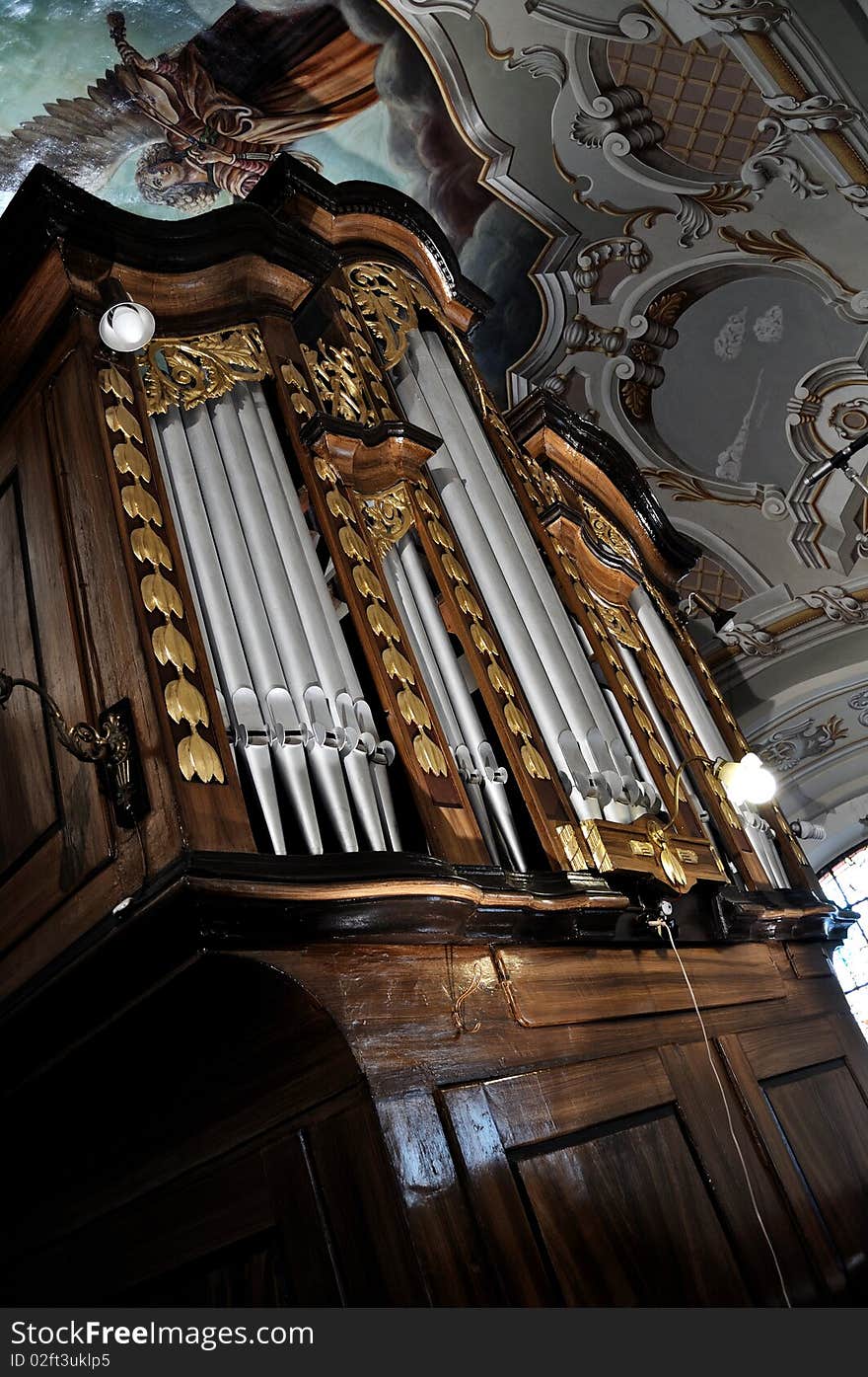 Detail look of a historic pipe organ in church