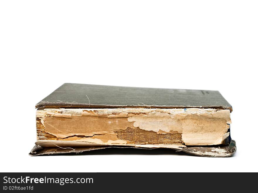 Detail of an old book isolated on white.