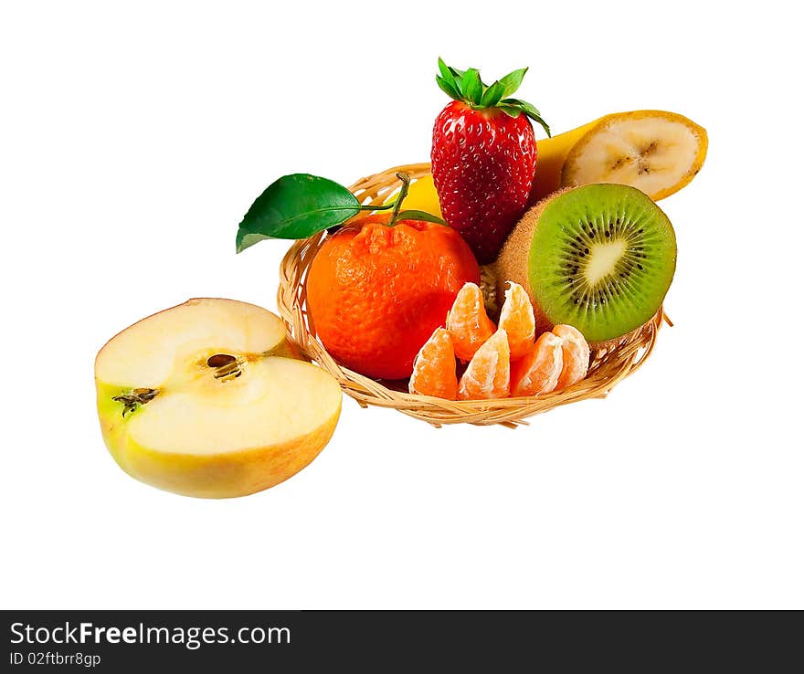 Fresh fruit in a wicker plate: strawberries, kiwi, apple, banana, tangerines. Isolated. Fresh fruit in a wicker plate: strawberries, kiwi, apple, banana, tangerines. Isolated