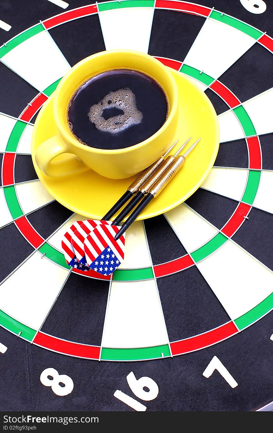 Darts and coffee, in bright cups on a white background