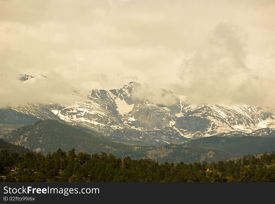 Foggy Mountain with clouds in background