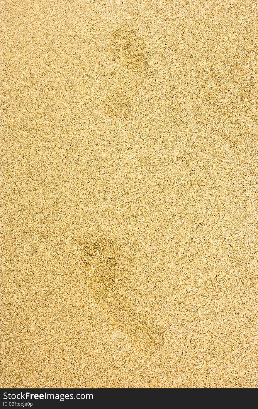 Footprints on smooth sand ground. Footprints on smooth sand ground.