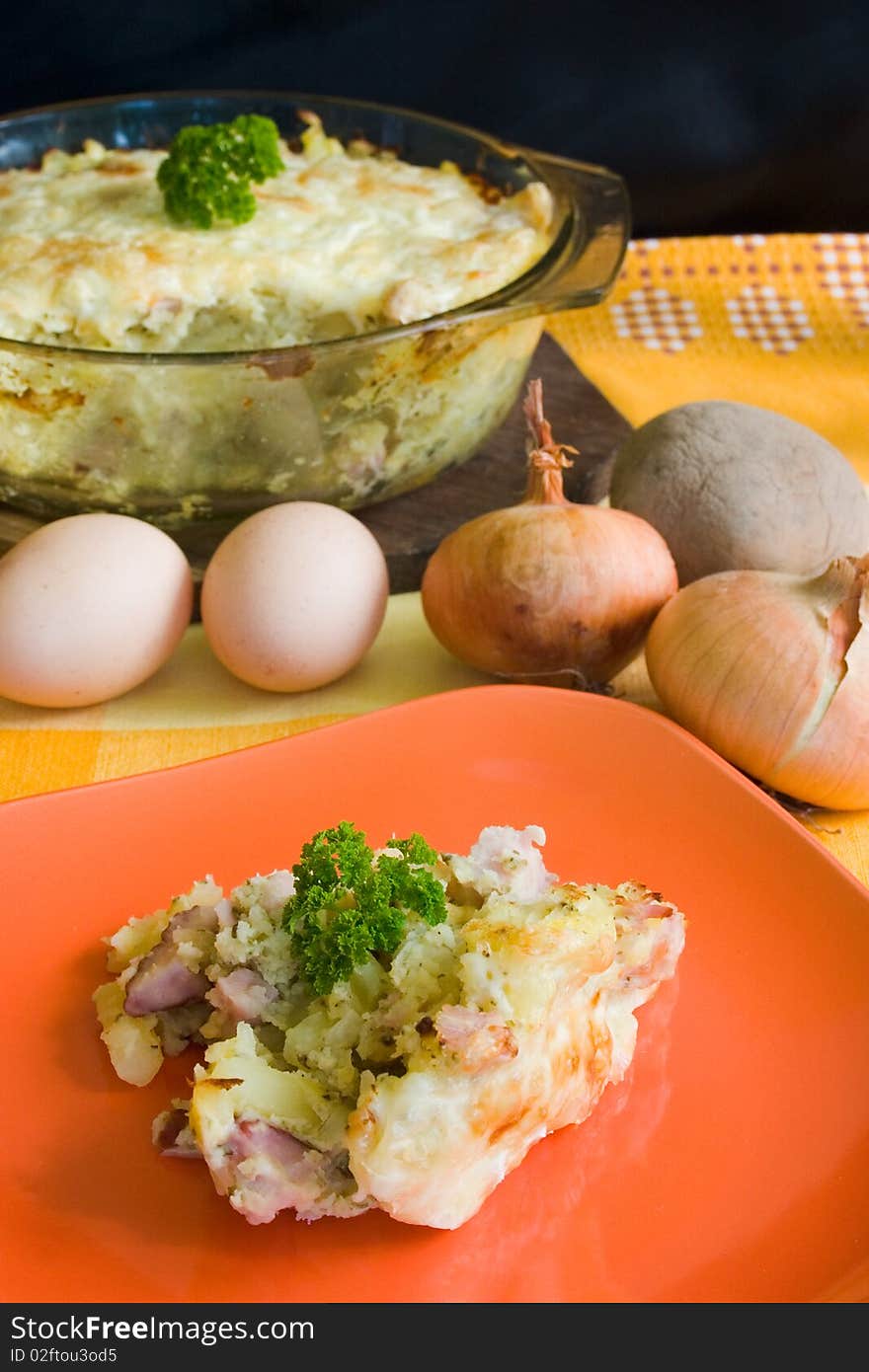 Baked potatoes with cheese and onions