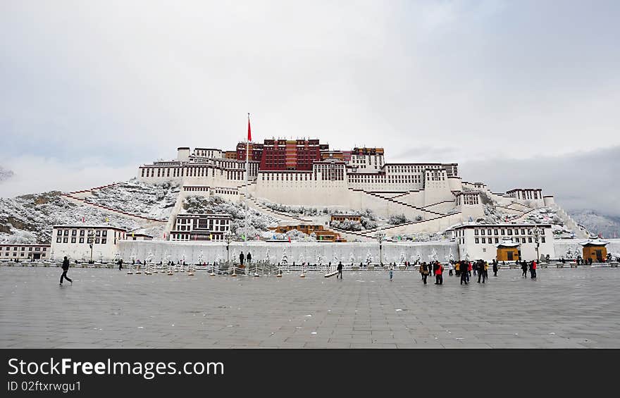 The Potala, the traditional but deserted, residence of the Dalai Lama in Lhasa, Tibet, China. The photo was taken after snow on Apr.1,2010, Potala was covered by snow. The Potala, the traditional but deserted, residence of the Dalai Lama in Lhasa, Tibet, China. The photo was taken after snow on Apr.1,2010, Potala was covered by snow.