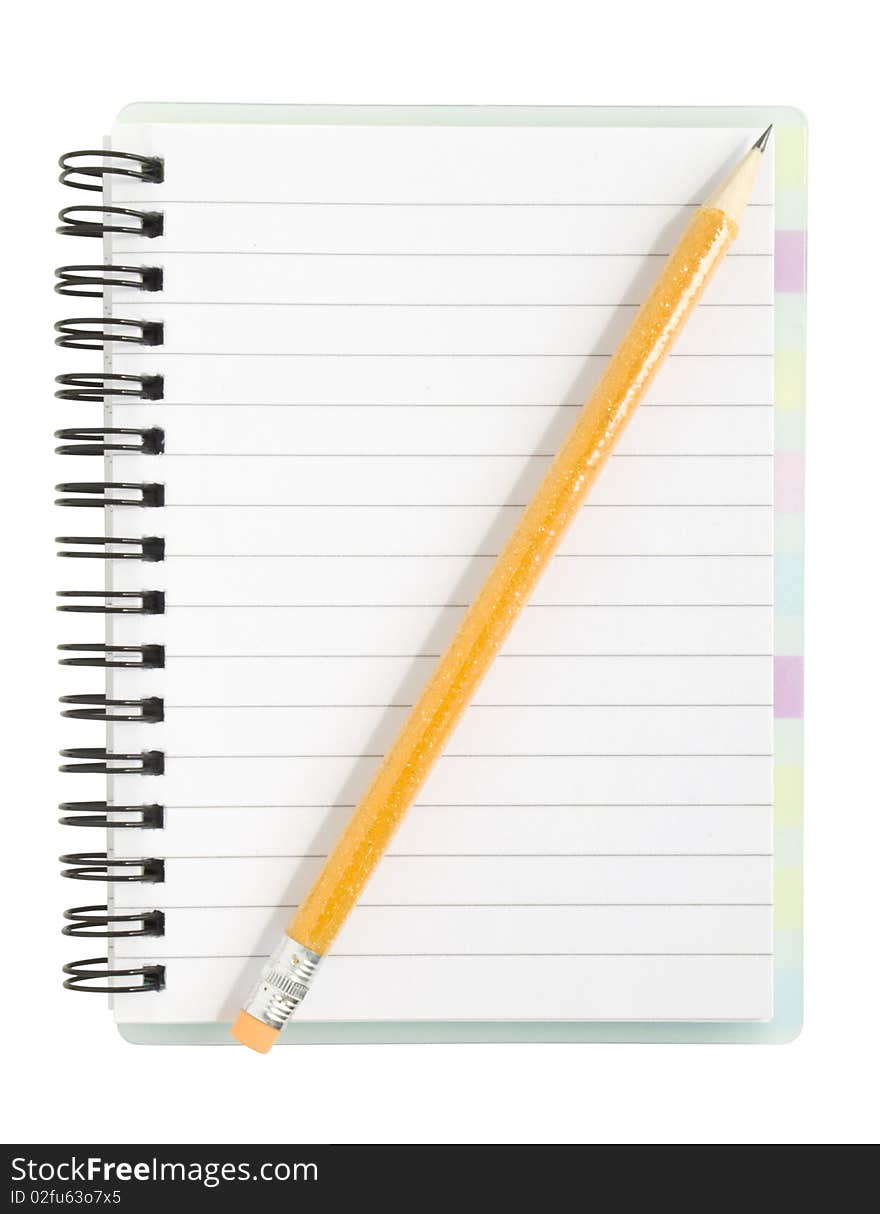 Pencil and notebook on white background