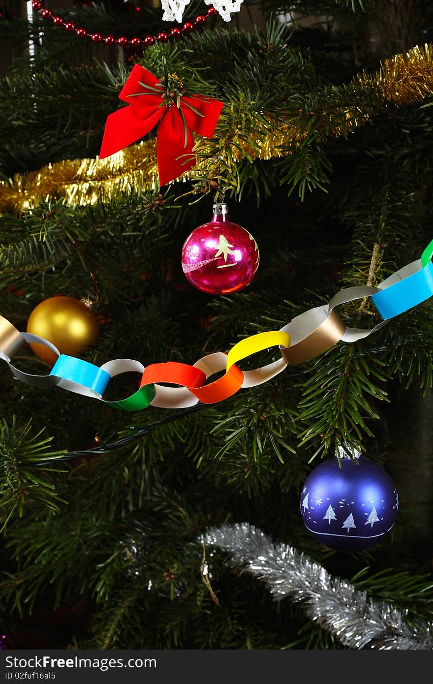 Colorful, traditional Christmas decorations on the Christmas tree