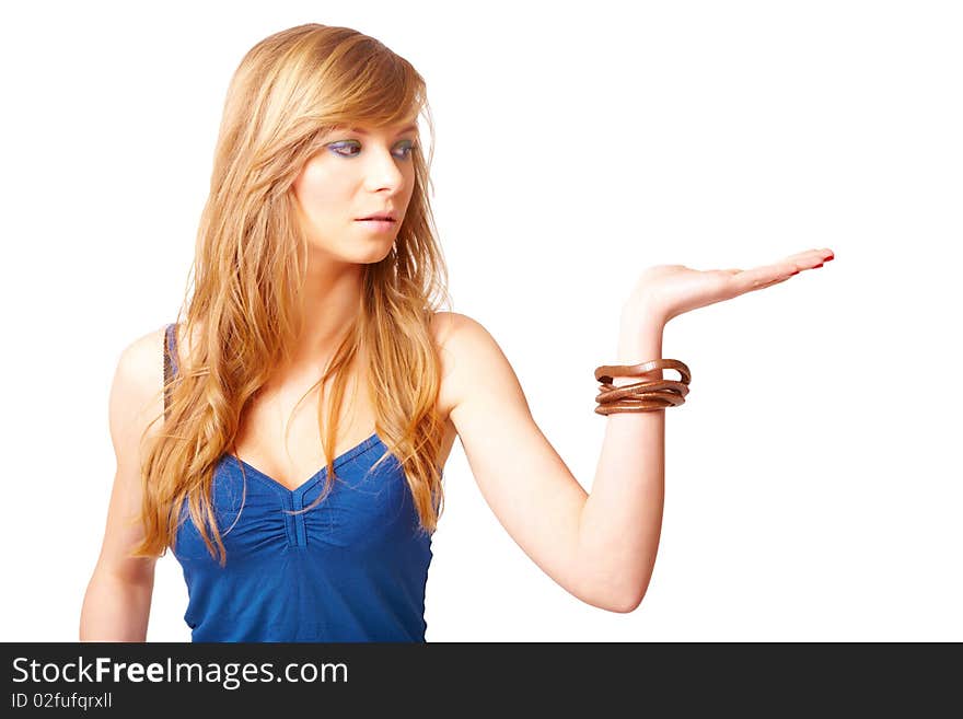 Beautiful young girl presenting something on her hand. Beautiful young girl presenting something on her hand.