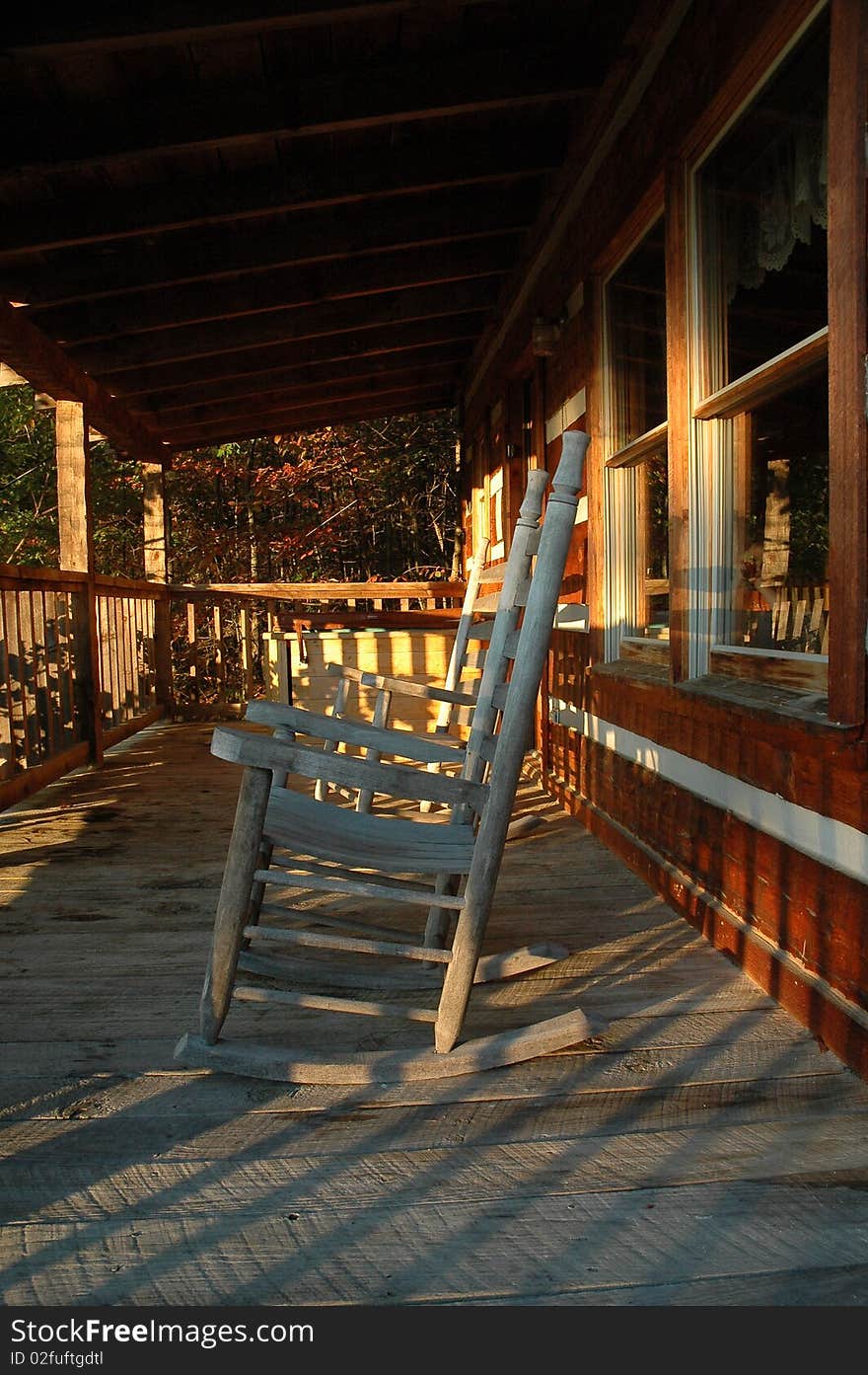 Rocking In Shadow on a cabin deck