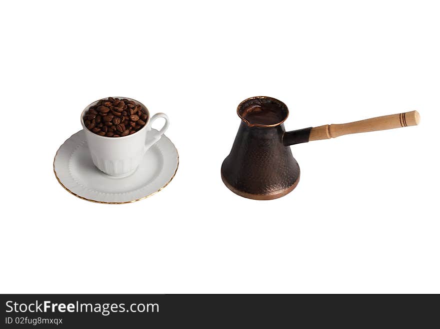 Coffee pot and cup with coffe beans